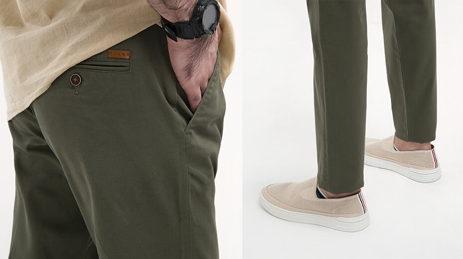 Close up of model in Sage Olive chinos